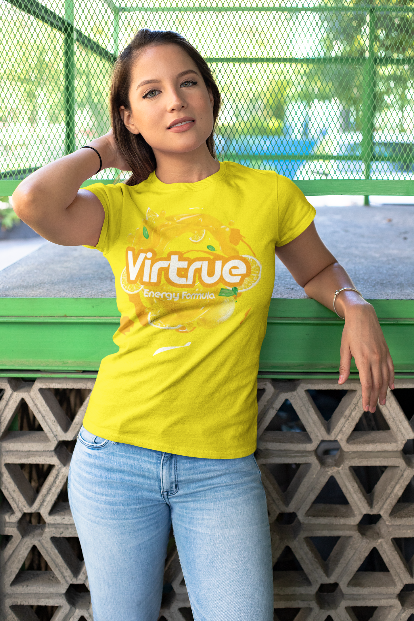 Lady wearing a yellow virtrue shirt.
