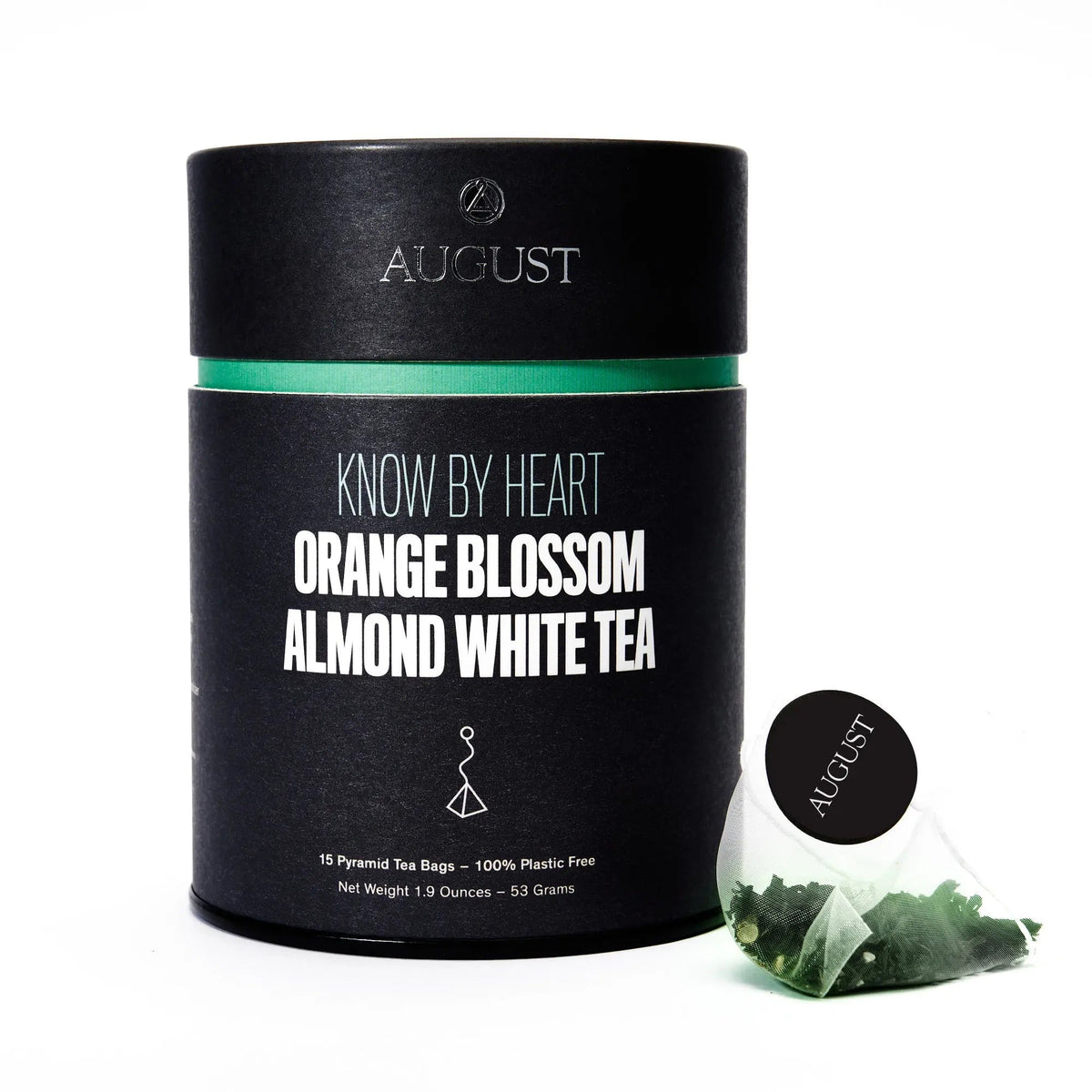 August Know by Heart Orange Blossom Almond White Tea in a black tin with green accents and 15 tea bags