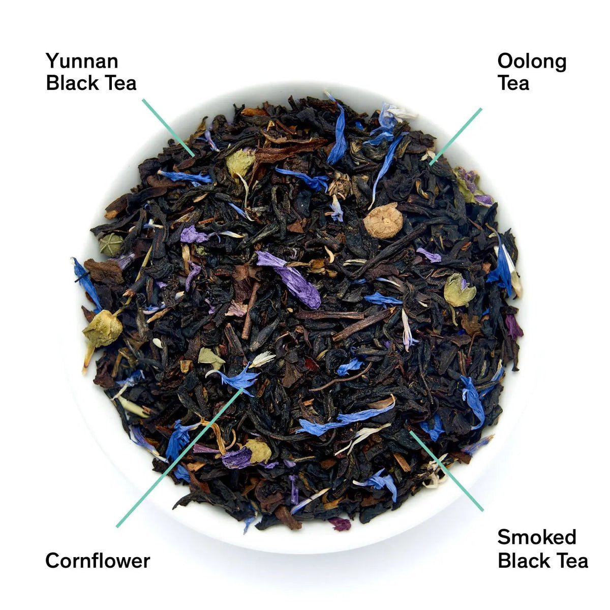 Close-up of Black Metallic black tea blend with blue mallow flowers, oolong tea and smoked black tea