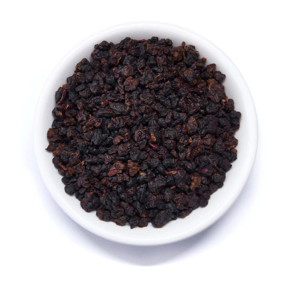 Close-up of dark roasted Taiwanese oolong loose leaf tea from August Rare Leaves Black Pearl