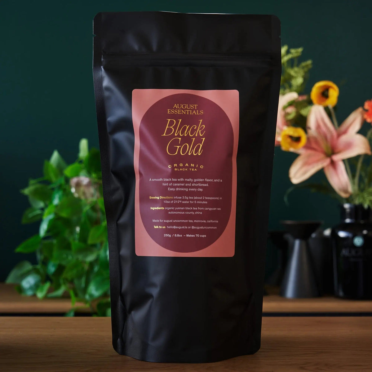 August Essentials Black Gold organic black tea in large black refill pouch
