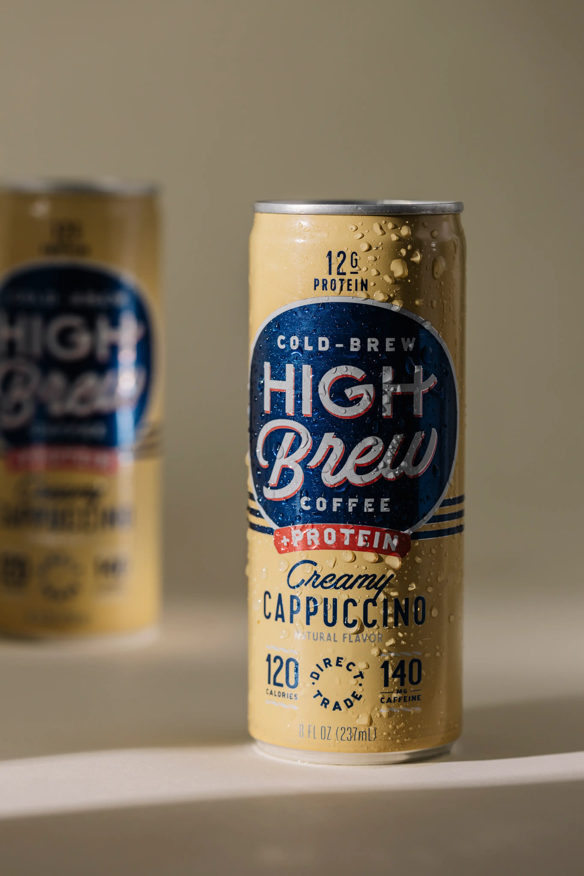 High Brew Creamy Cappuccino protein cold brew coffee can displayed on a countertop