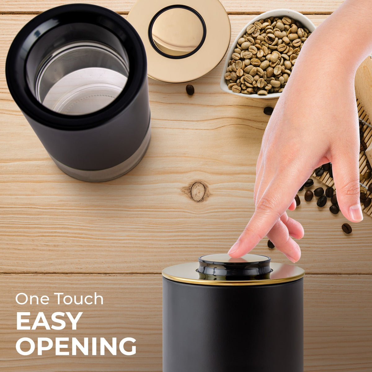 Hand opening the lid of a Kaffé airtight glass coffee storage container