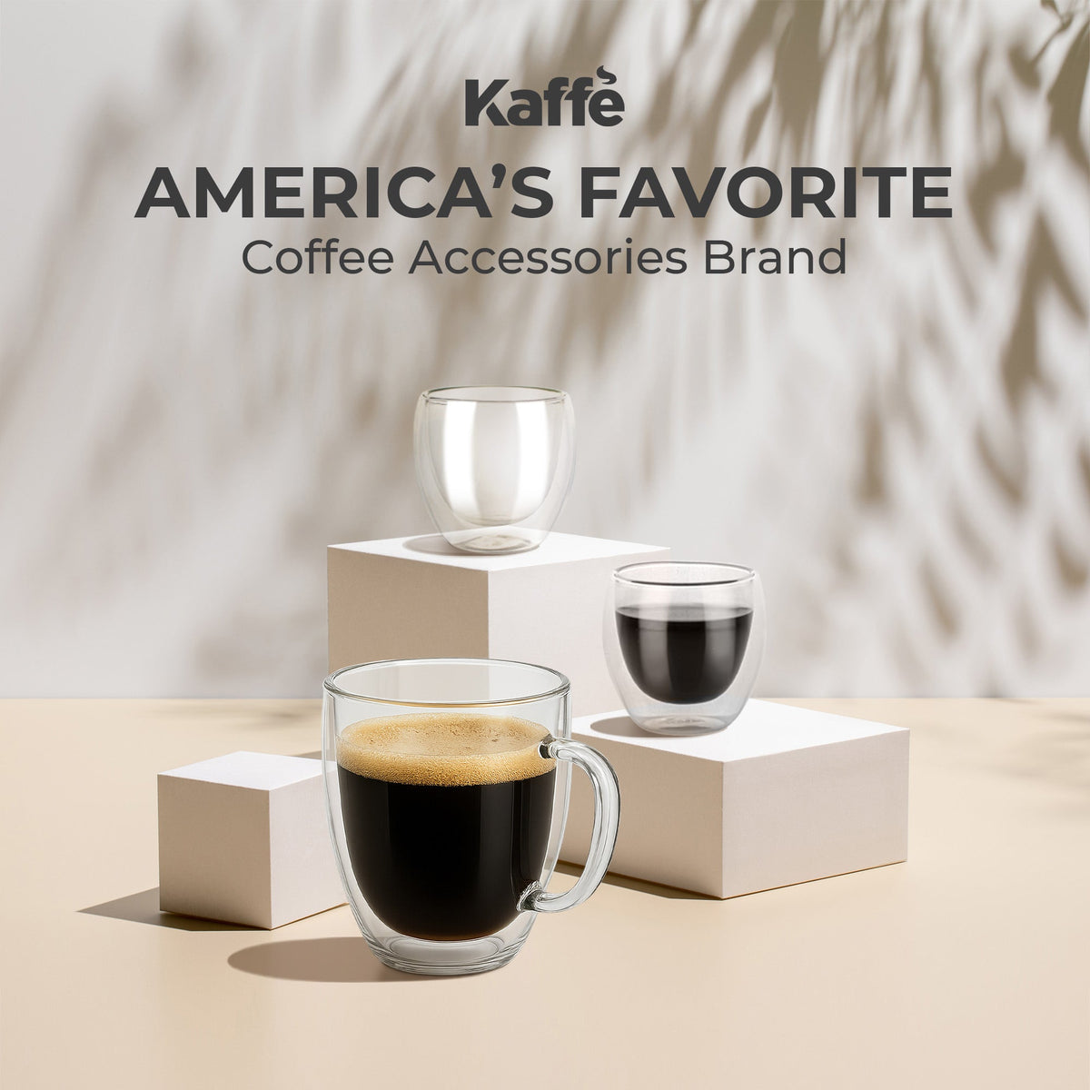 Kaffé double wall coffee mugs displayed with premium coffee and espresso accessories