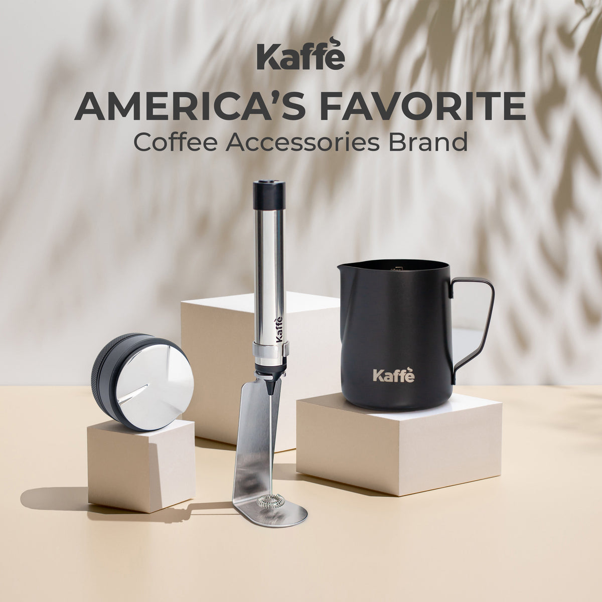 Kaffé USB rechargeable handheld milk frother with stainless steel whisk attachments and countertop stand