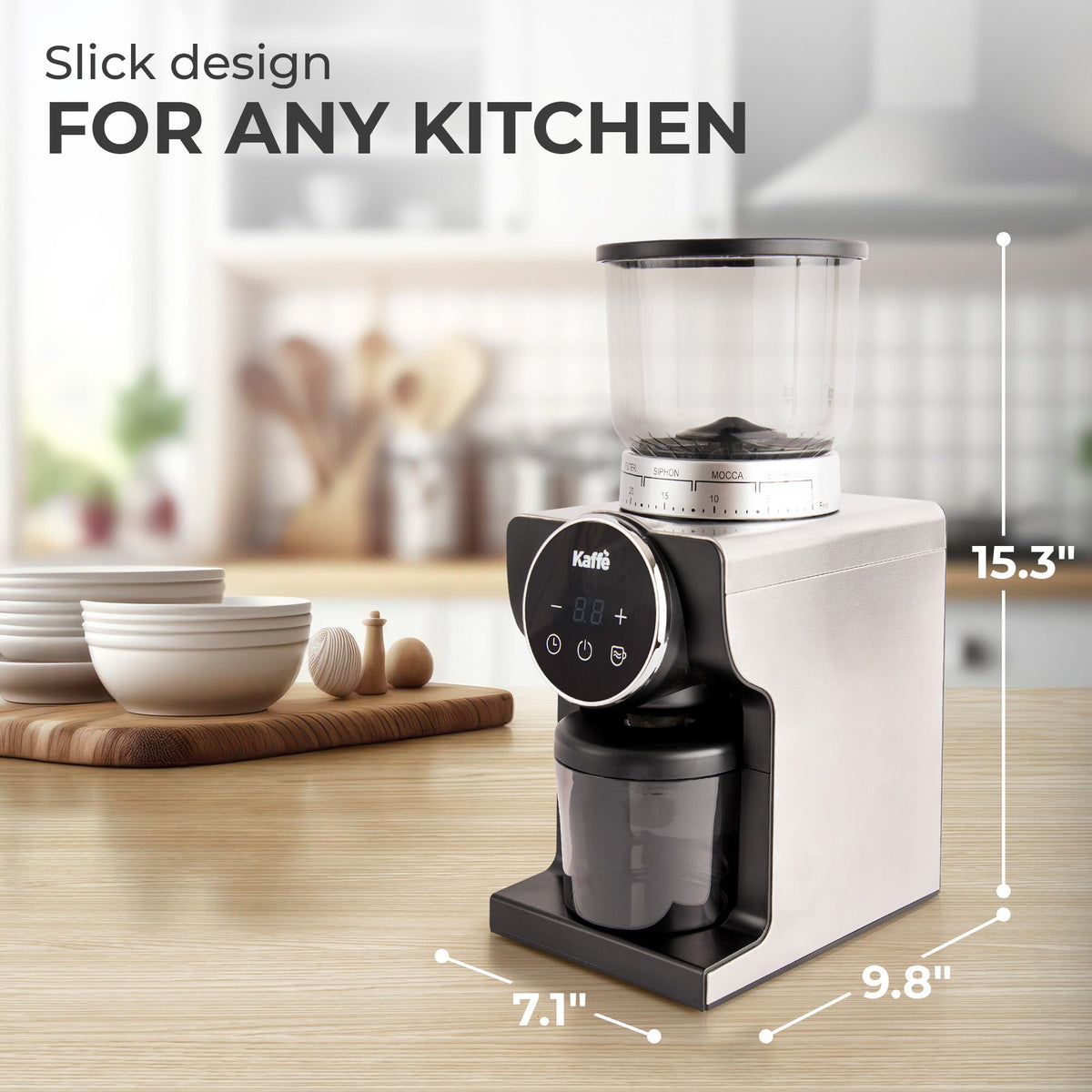 Kaffé electric coffee grinder with stainless steel accents displayed on a kitchen countertop