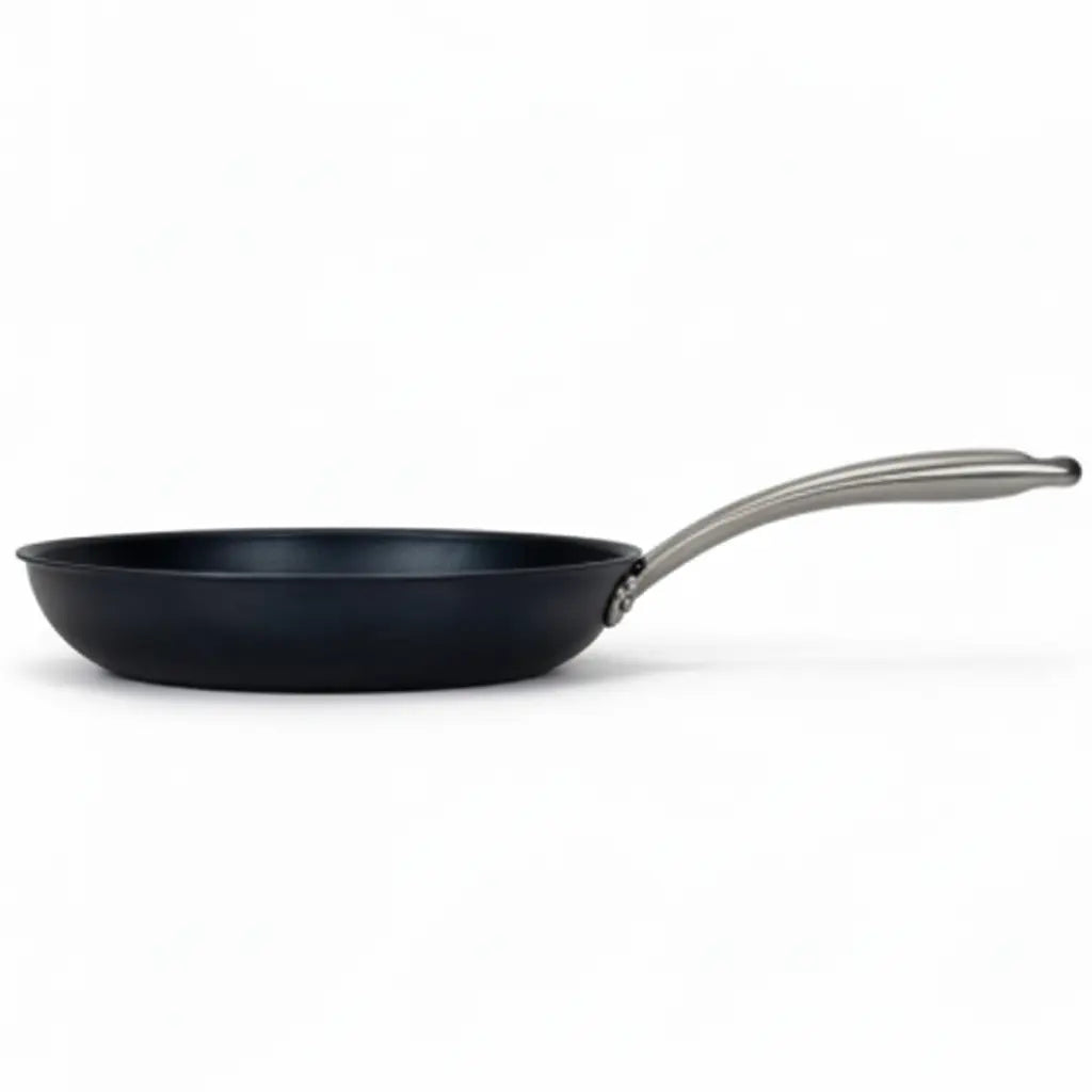 Side view of an Alva Black Angus carbon steel frying pan showing its low-profile design