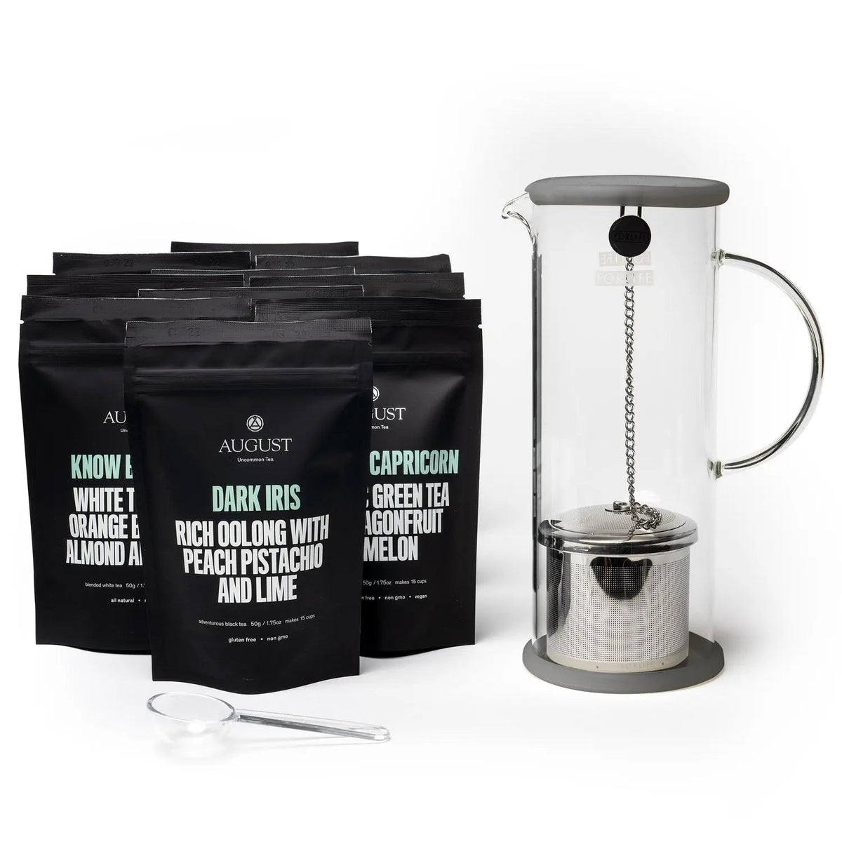 August Top 10 Iced Tea Sampler with assorted loose leaf tea pouches and glass iced tea brewer