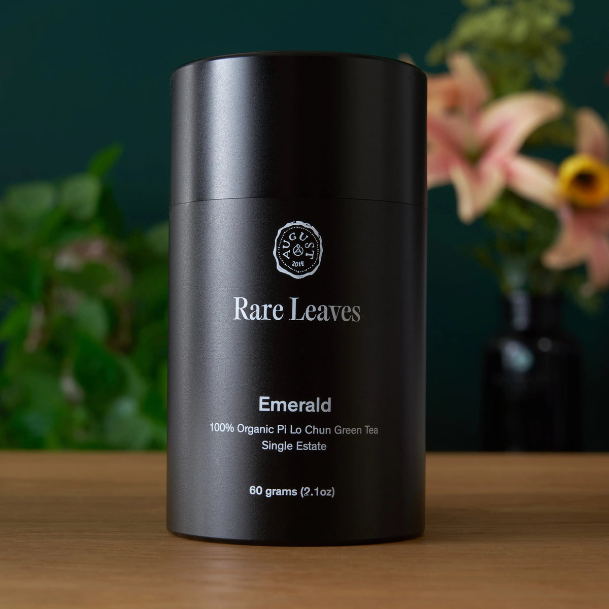 August Rare Leaves Emerald organic Pi Lo Chun loose leaf green tea in premium black aluminum tin
