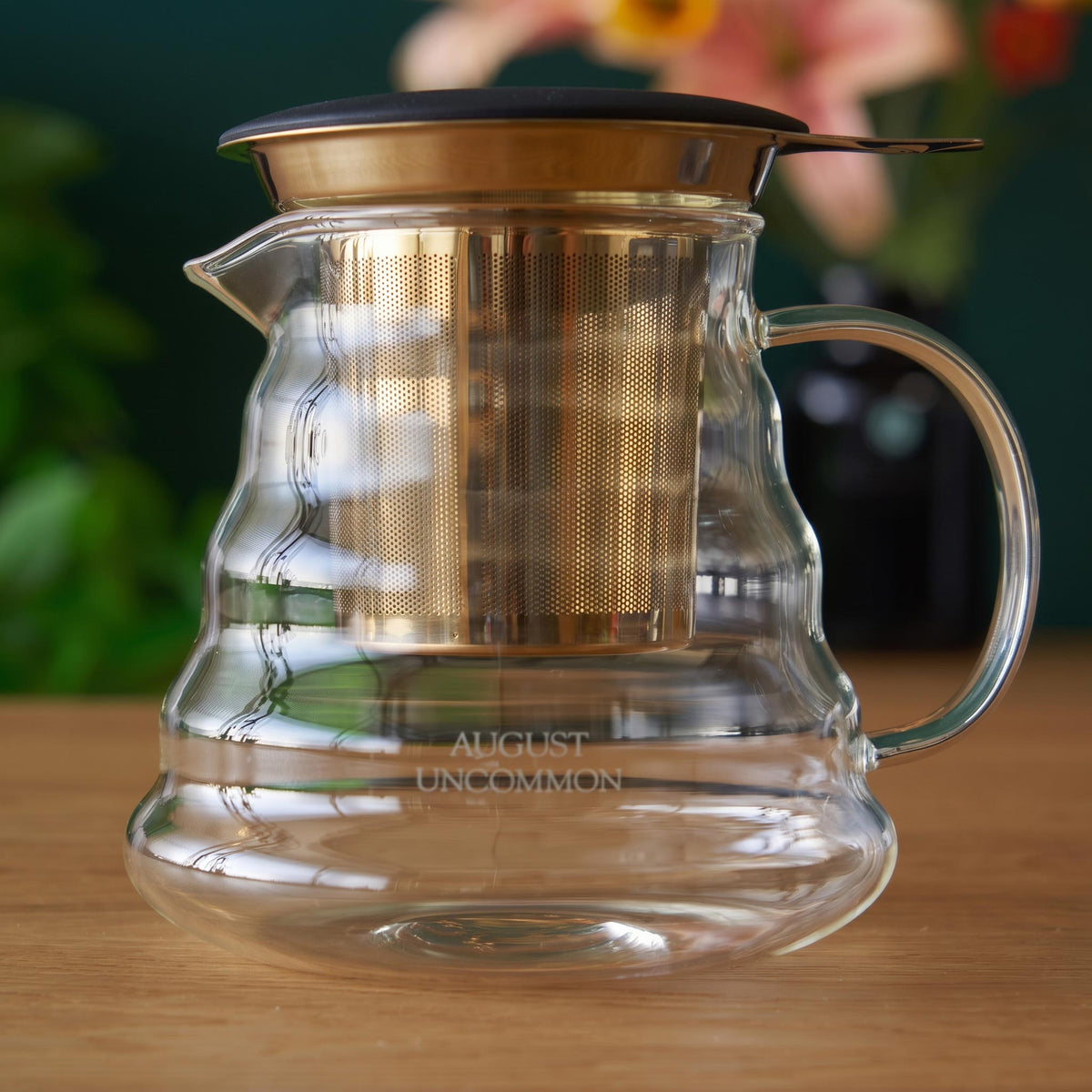 Clear glass tea mug with stainless steel infuser and silicone lid